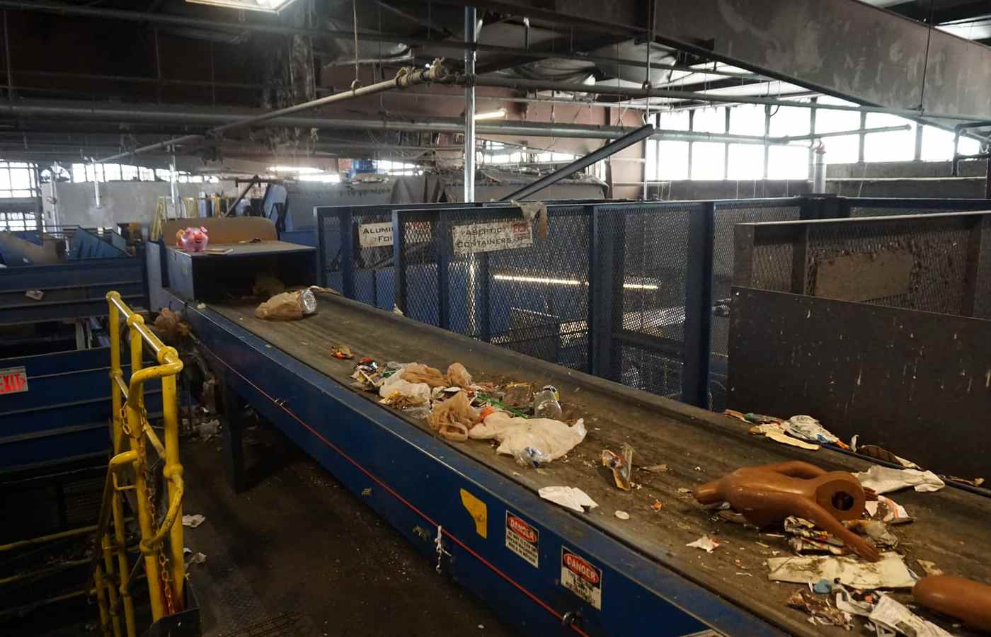 A picking line conveyor inside a materials recovery facility
